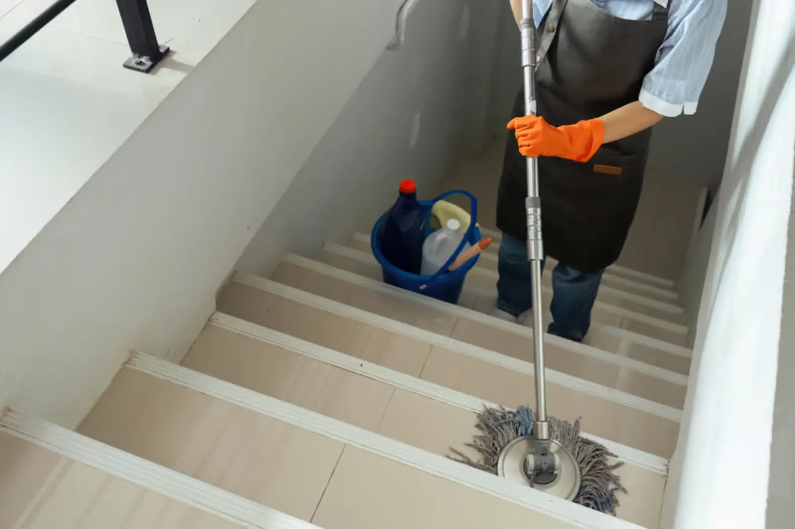 Freshly cleaned narrow wooden staircase inside a Philadelphia rowhome